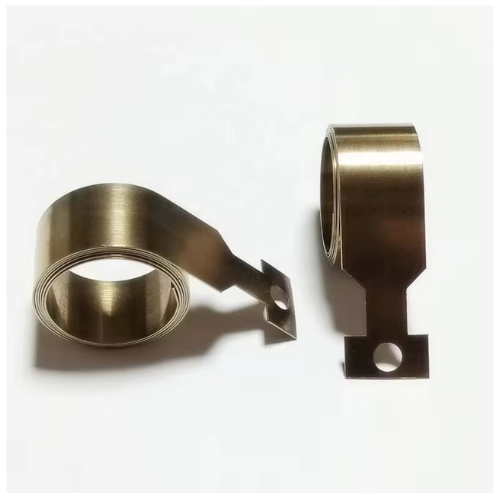 Variable force spring for shelf pusher systems providing smooth and controlled pushing force spring